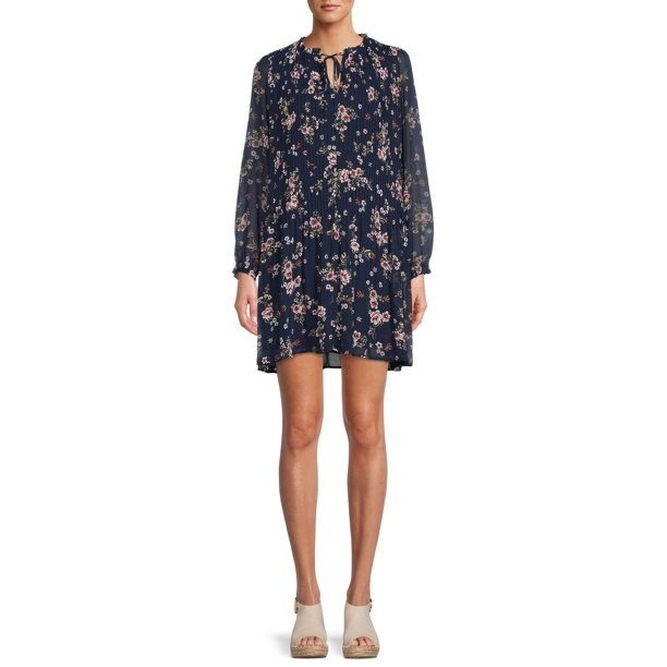 A navy floral pleated dress