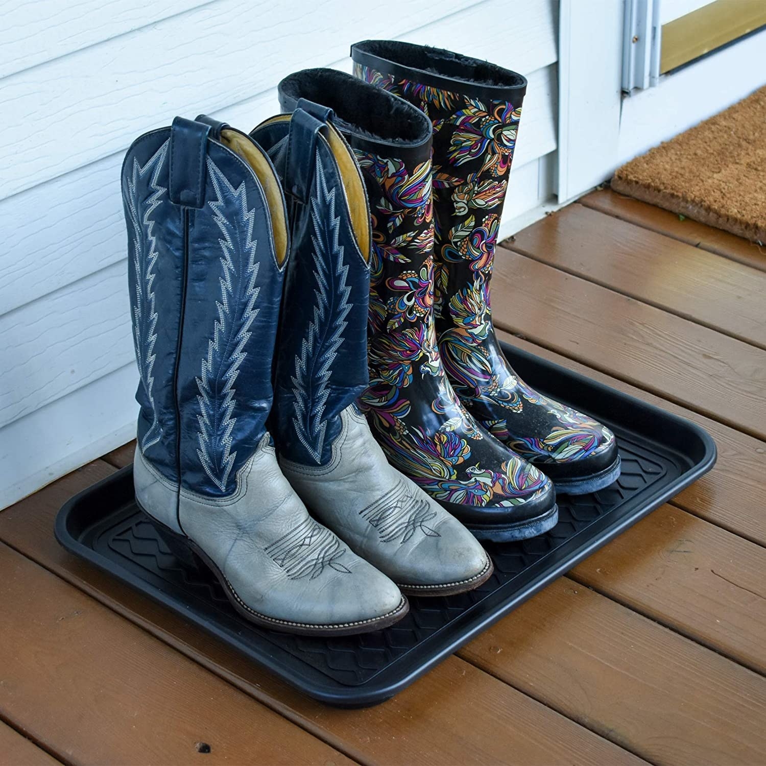 Two pairs of boots on the tray