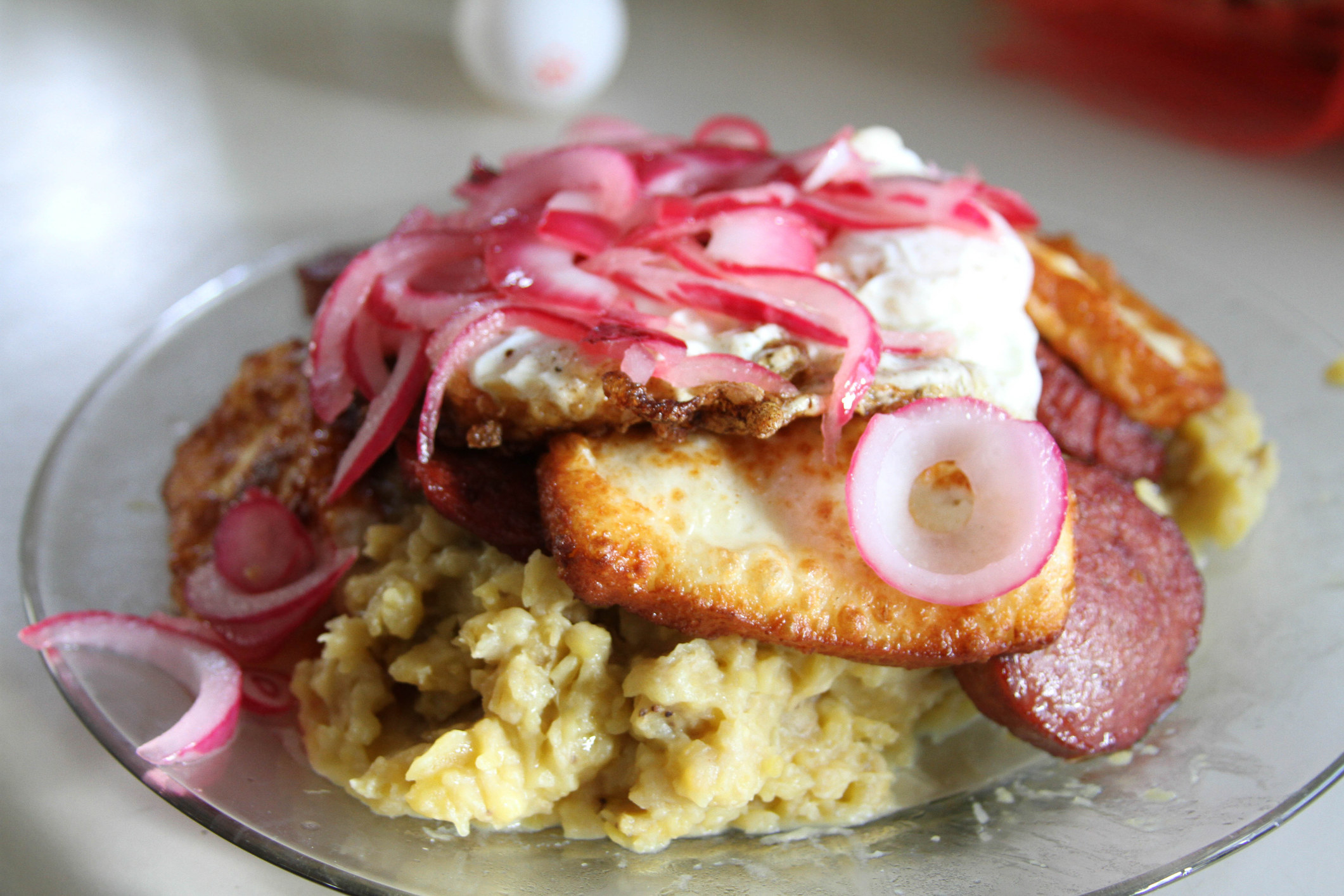 Plate of mangú, a popular Dominican breakfast dish.