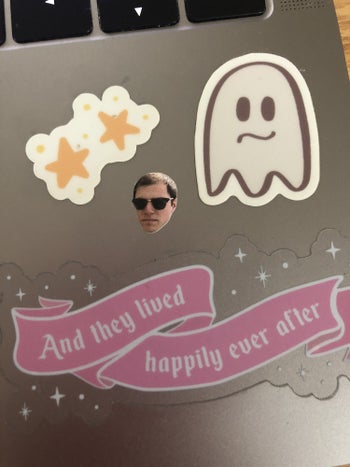 a small sticker of the writer's husband's face
