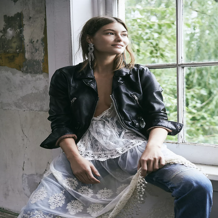 Model wearing vegan leather jacket by Free People