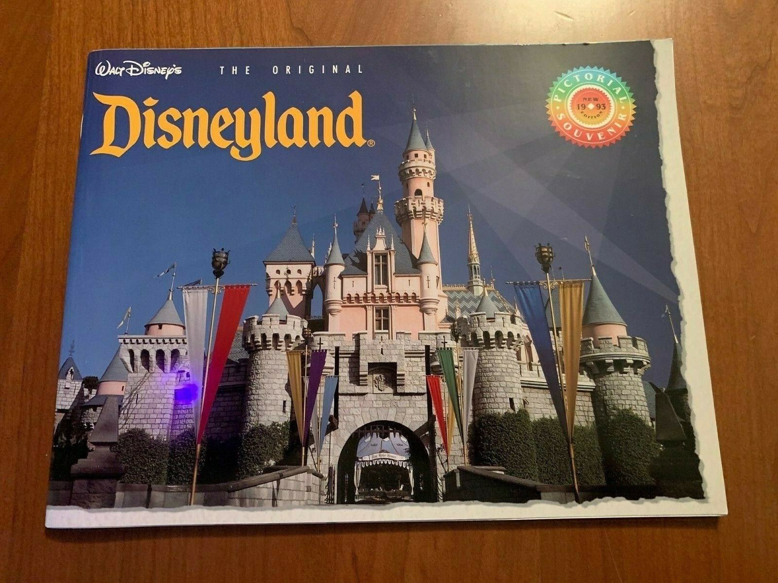 Disneyland souvenir book with the castle on the cover