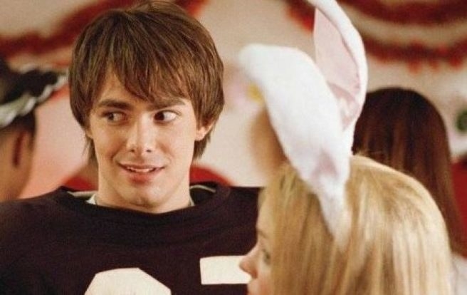 Aaron Samuels at a Halloween party in a football jersey