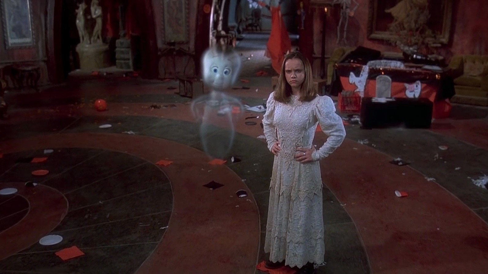 Kat in a white dress next to Casper the friendly ghost