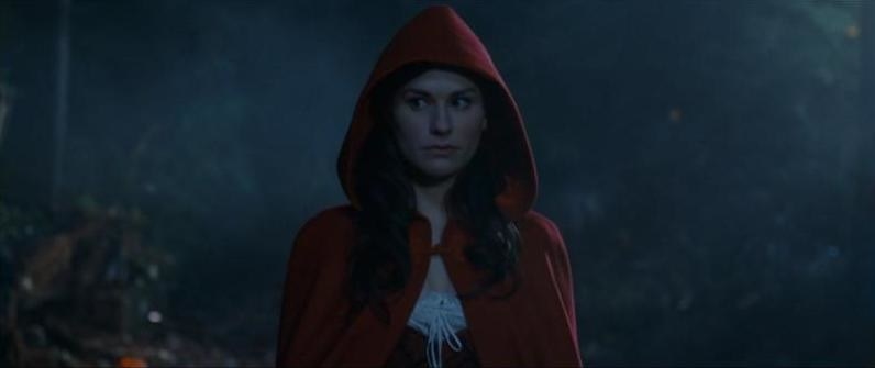 Laurie in a red hood and dress