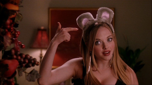 Karen Smith points to her mouse ear headband