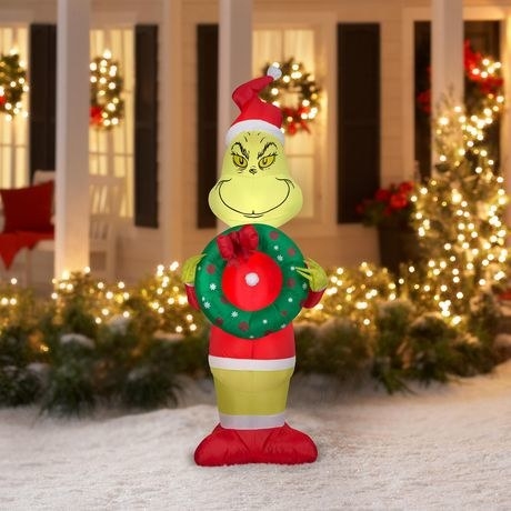 the grinch inflatable on the front lawn