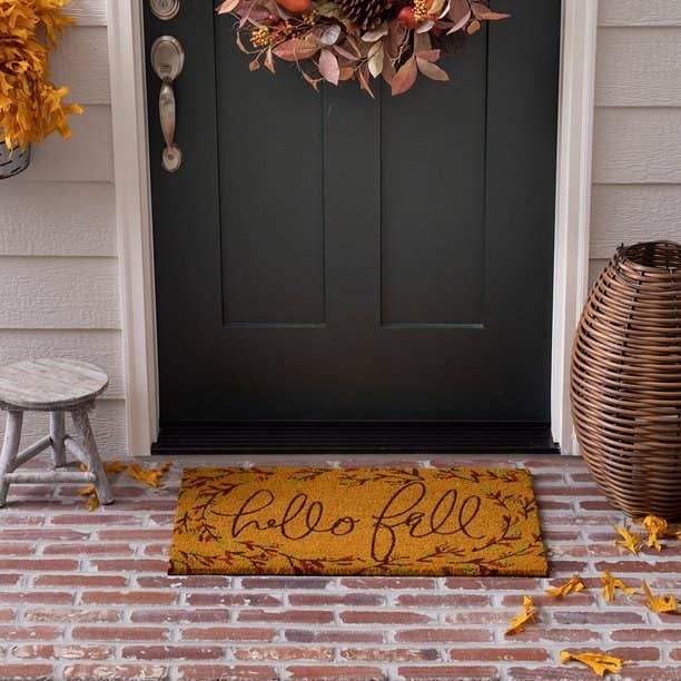 A welcome mat that says &quot;hello fall.&quot;