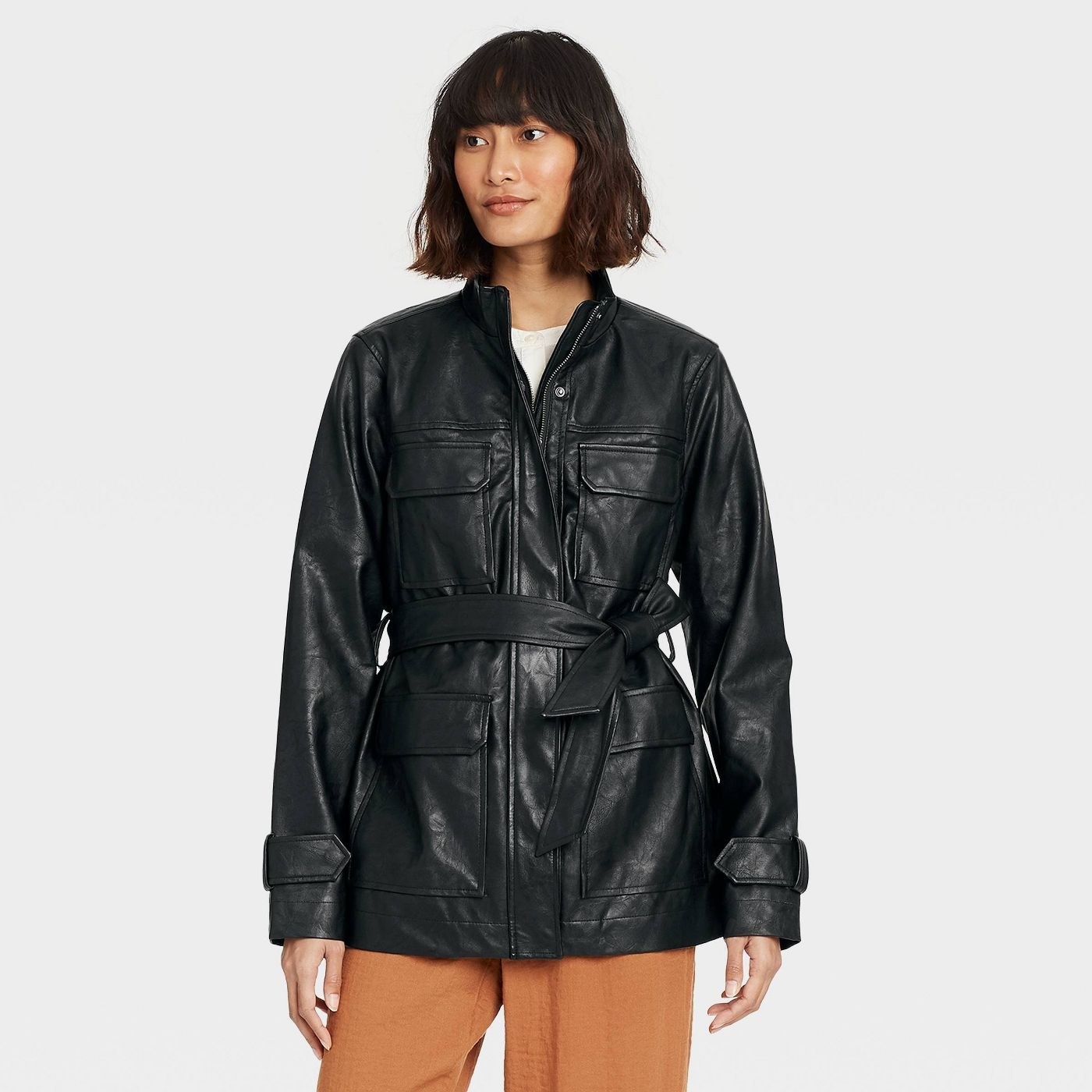 Model wearing the faux leather anorak jacket