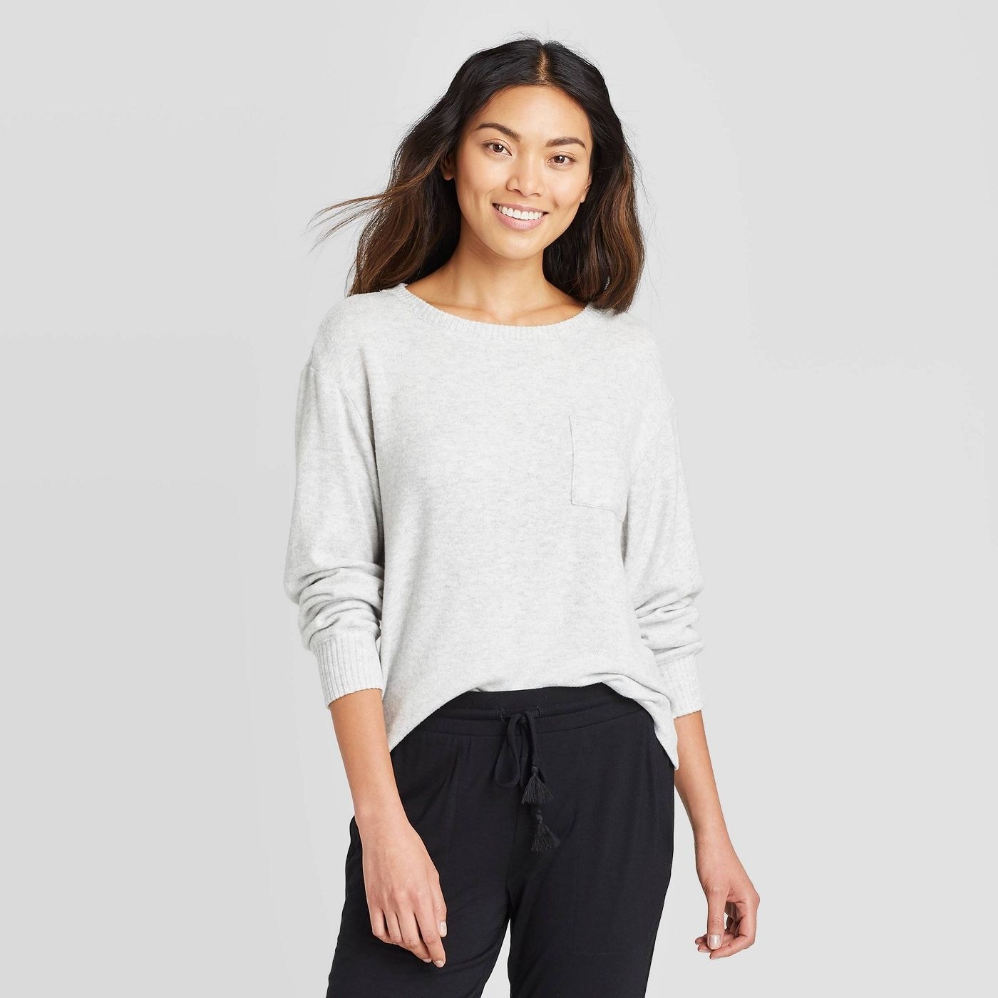 Model wearing the light gray perfectly cozy lounge sweatshirt
