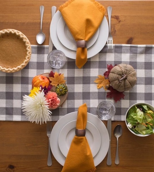 The table runner on a fully set table