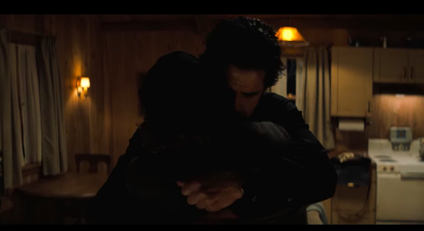 Father Hill hugging Joe Collie in &quot;Midnight Mass.&quot;