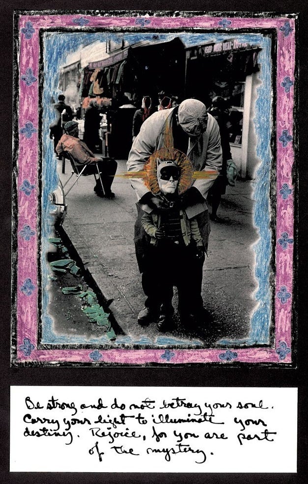 A photo with drawing on it showing a man bending down to secure a batman mask on his son's head