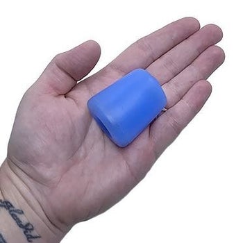 Model holding blue pleasure sleeve