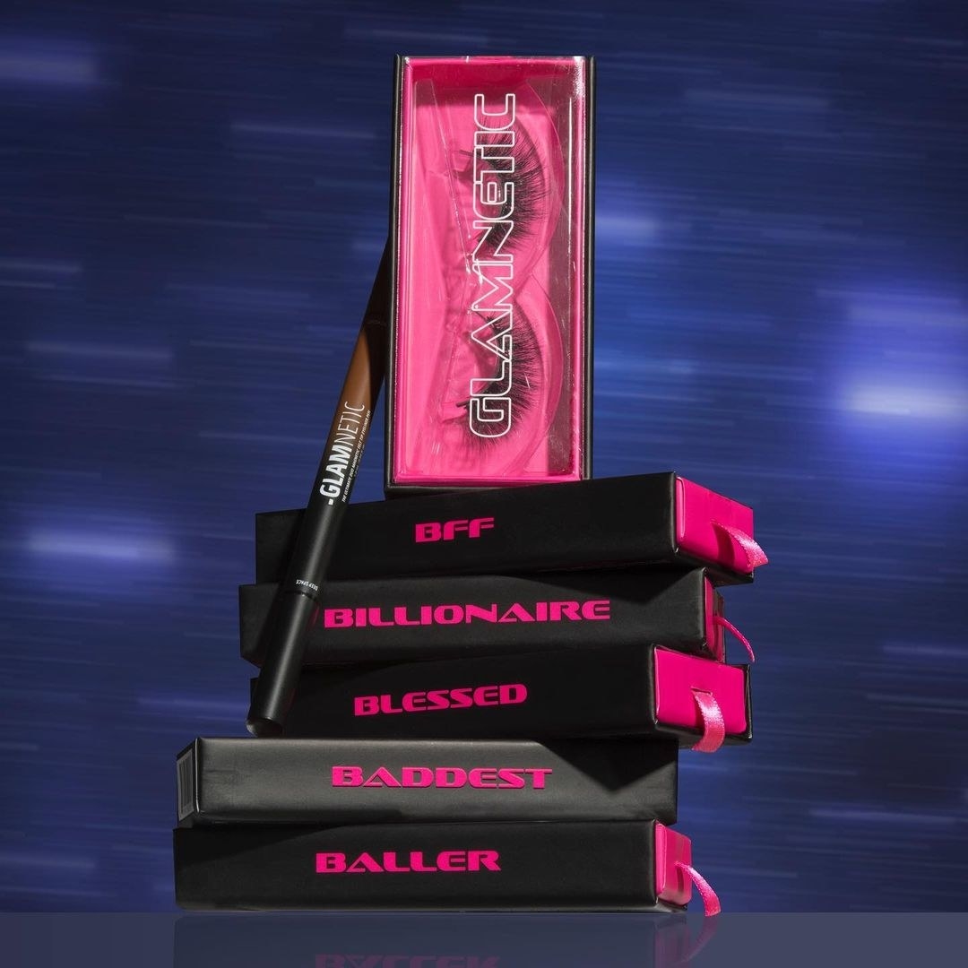 A stack of lashes with a liner pen leaning against them
