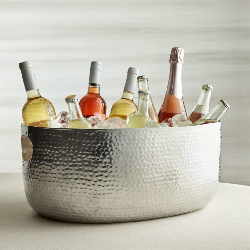 Product image of silver hammer textured beverage tub filled with ice and nine mixed glass bottles