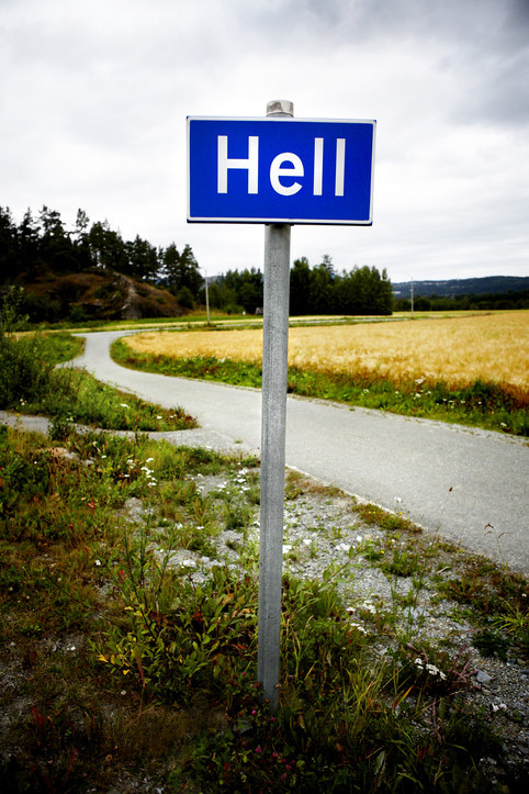 sign that says &quot;Hell&quot; on the side of the road