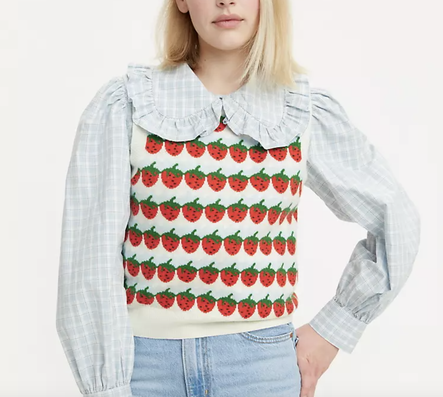 A model wearing the strawberry sweater vest