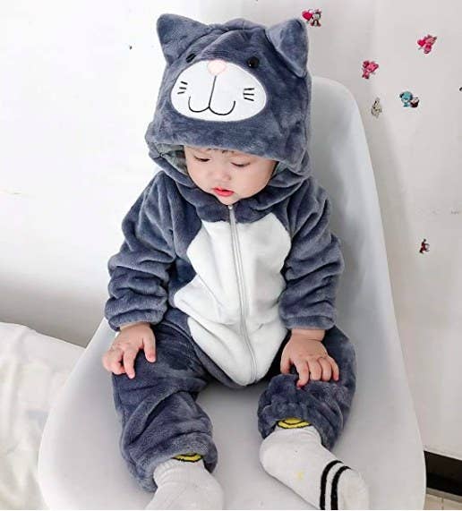 Child in grey cat costume