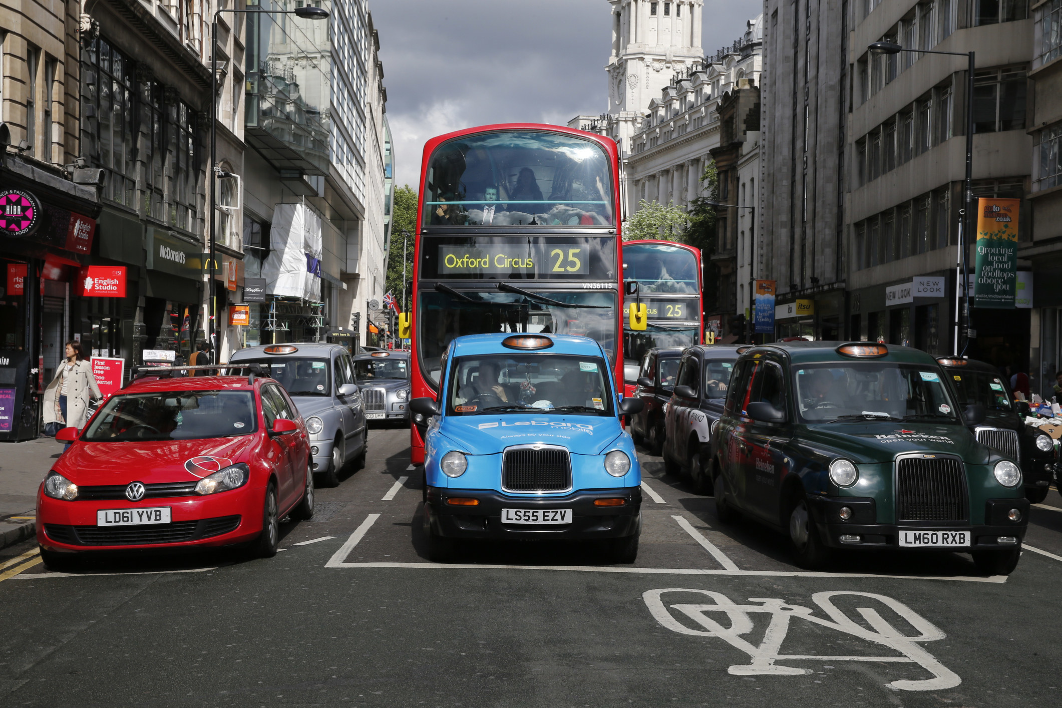 cars and busses on the road