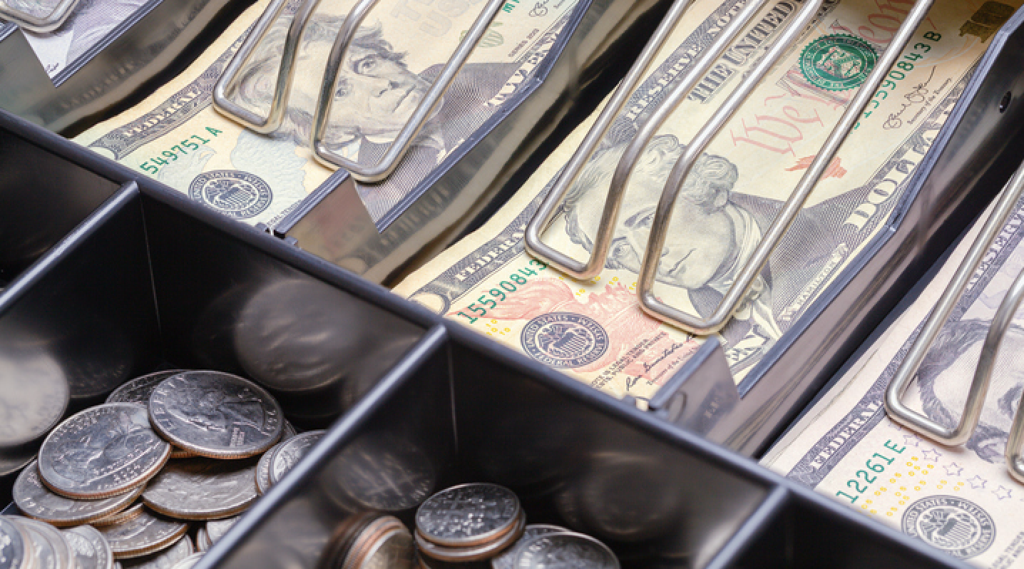 Cash and coins in the drawer