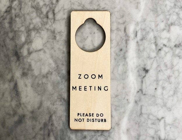 Door sign that says &quot;zoom meeting please do not disturb&quot;