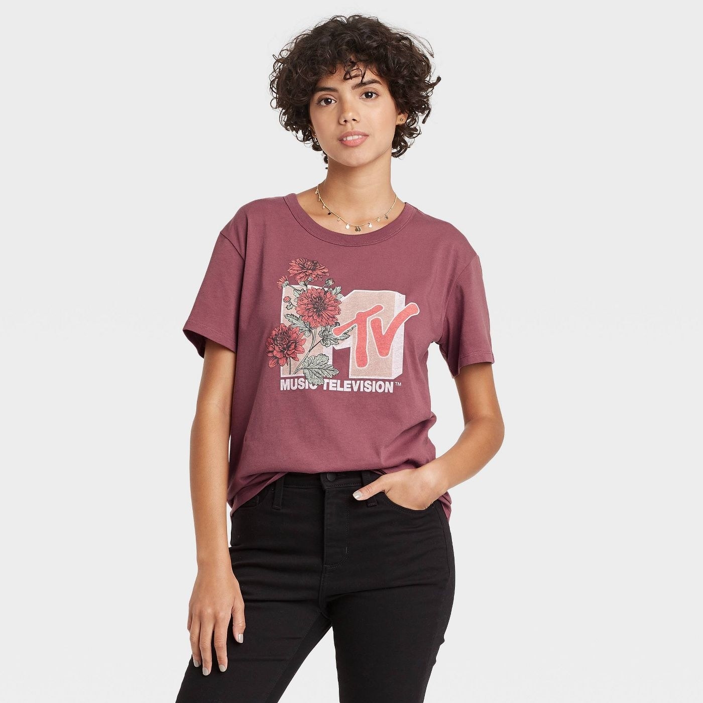 Model wearing the burgundy MTV floral print chart graphic t-shirt