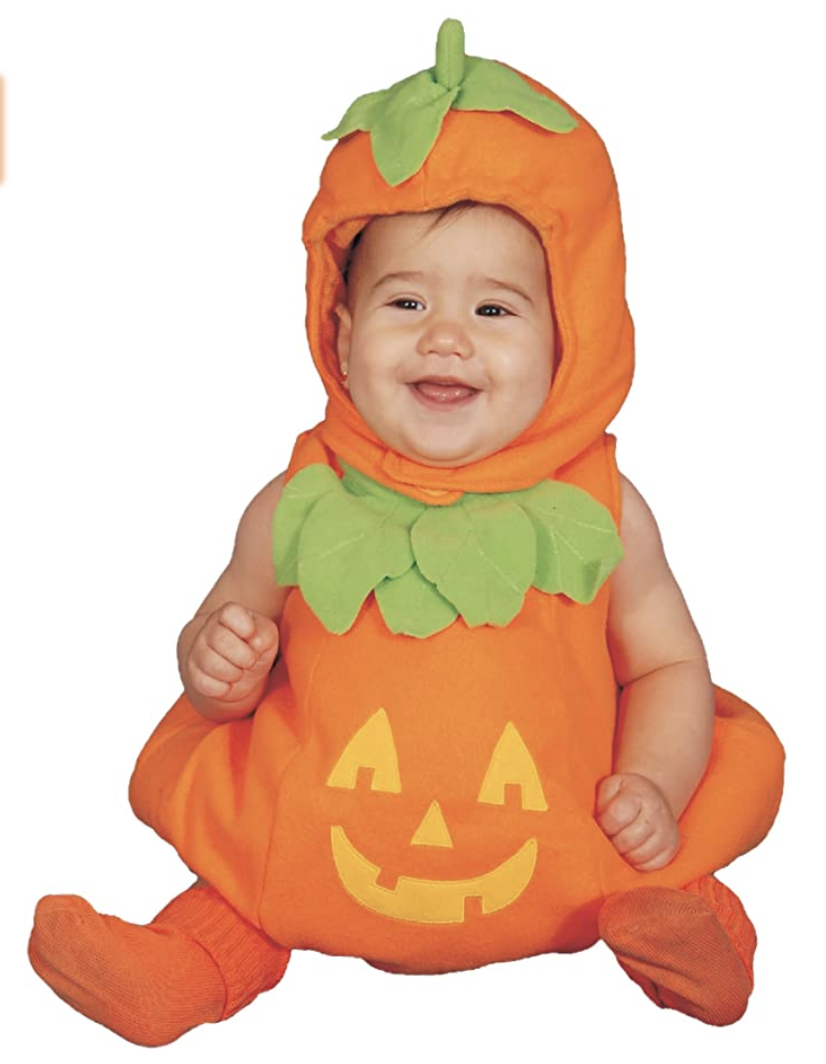 a baby wearing the pumpkin costume