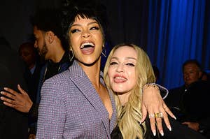 Rihanna and Madonna hugging and smiling