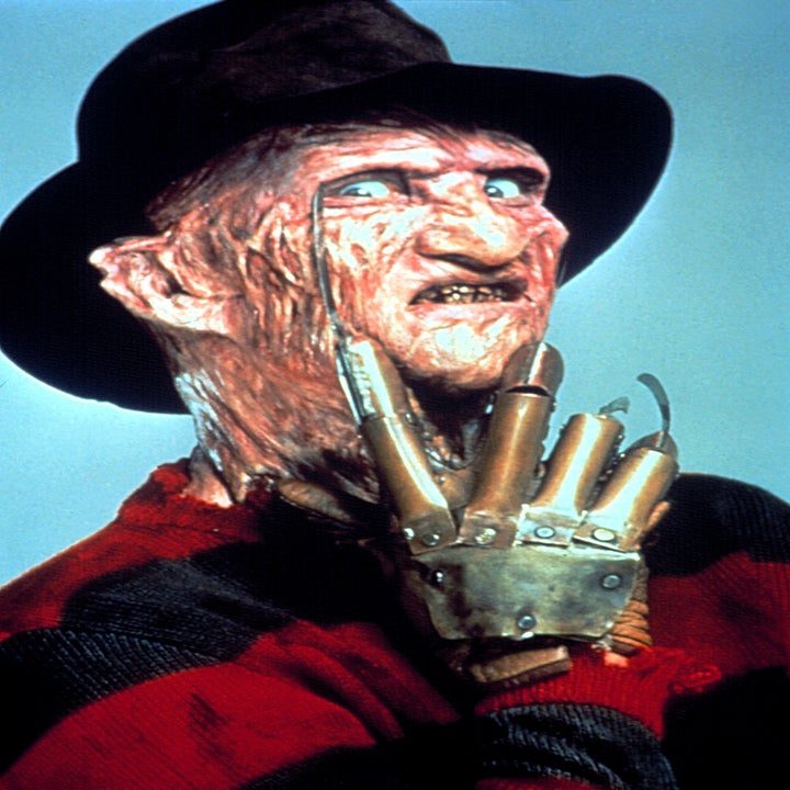 Freddy in his fedora, striped shirt, and mottled face