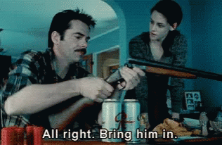 Charlie Swan from &quot;Twilight&quot; holding his gun, saying to Bella: &quot;All right. Bring him in&quot;