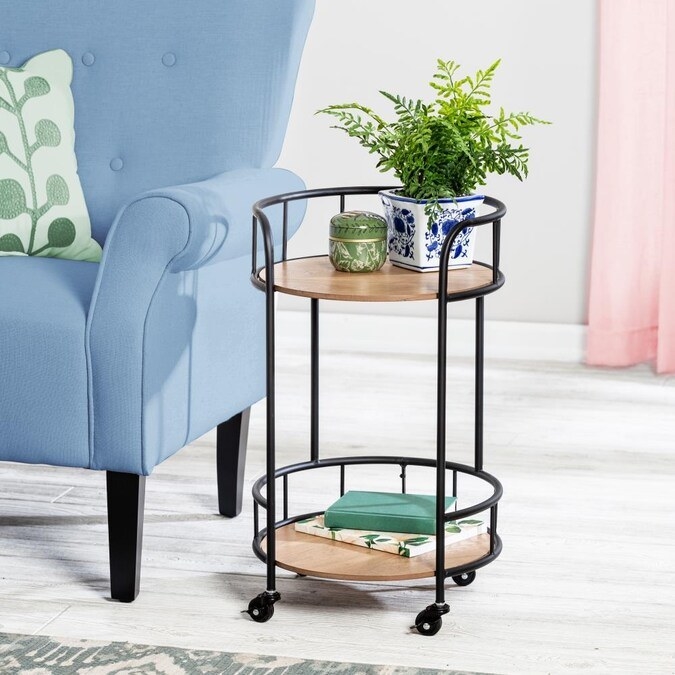 End table sitting next to an armchair
