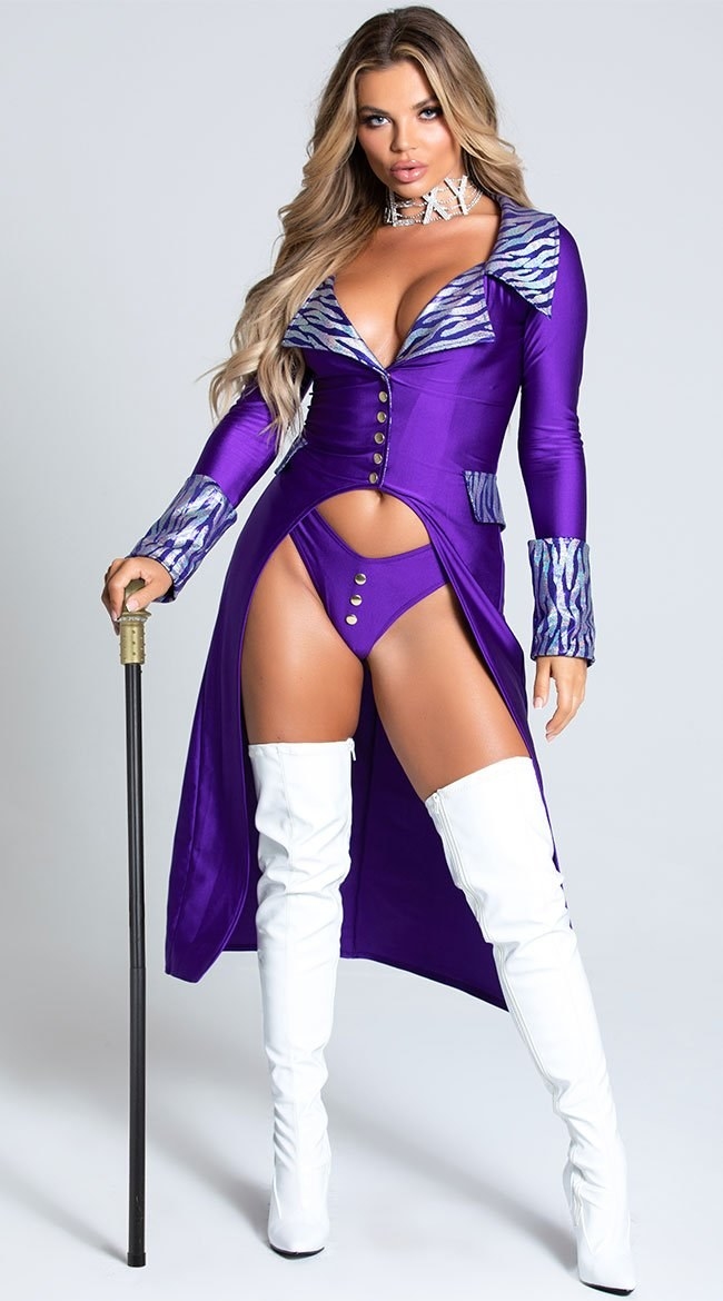 A woman wearing a purple coat purple panties and thigh high white boots and holding a cane