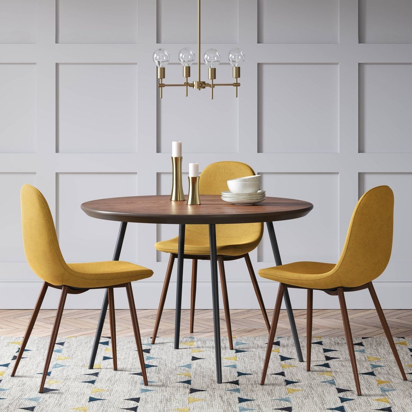 Three yellow chairs around a dining room table