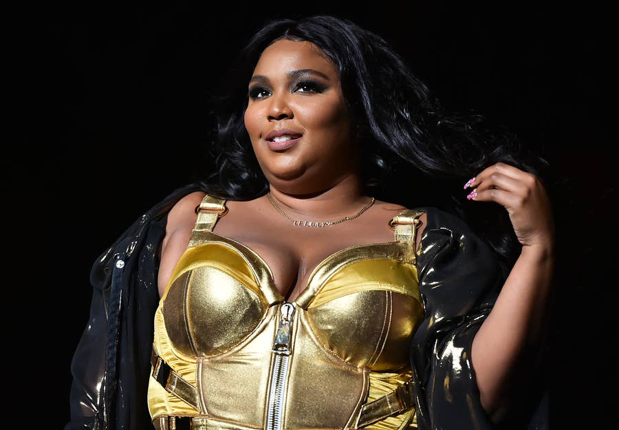 lizzo gold dress Lizzo Outfits: Her Most Iconic Looks Yet