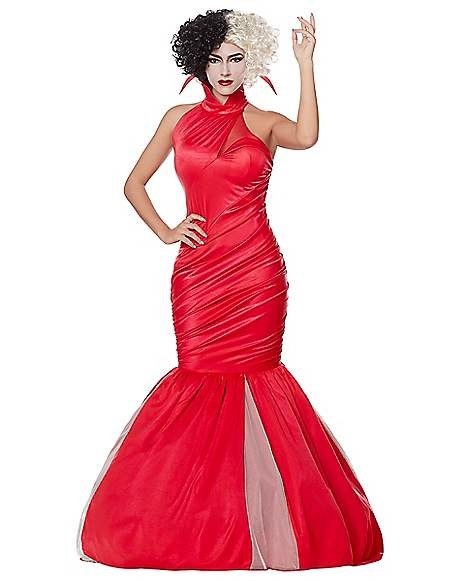 a model in a red cruella gown