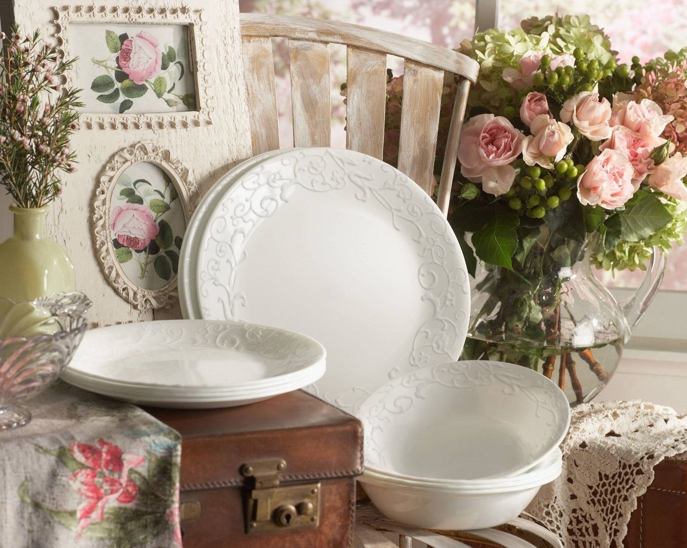 White embossed plates with pink and green antiques