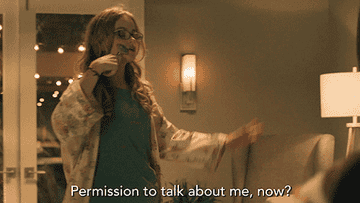 A woman on the phone saying, &quot;Permission to talk about me, now?&quot;