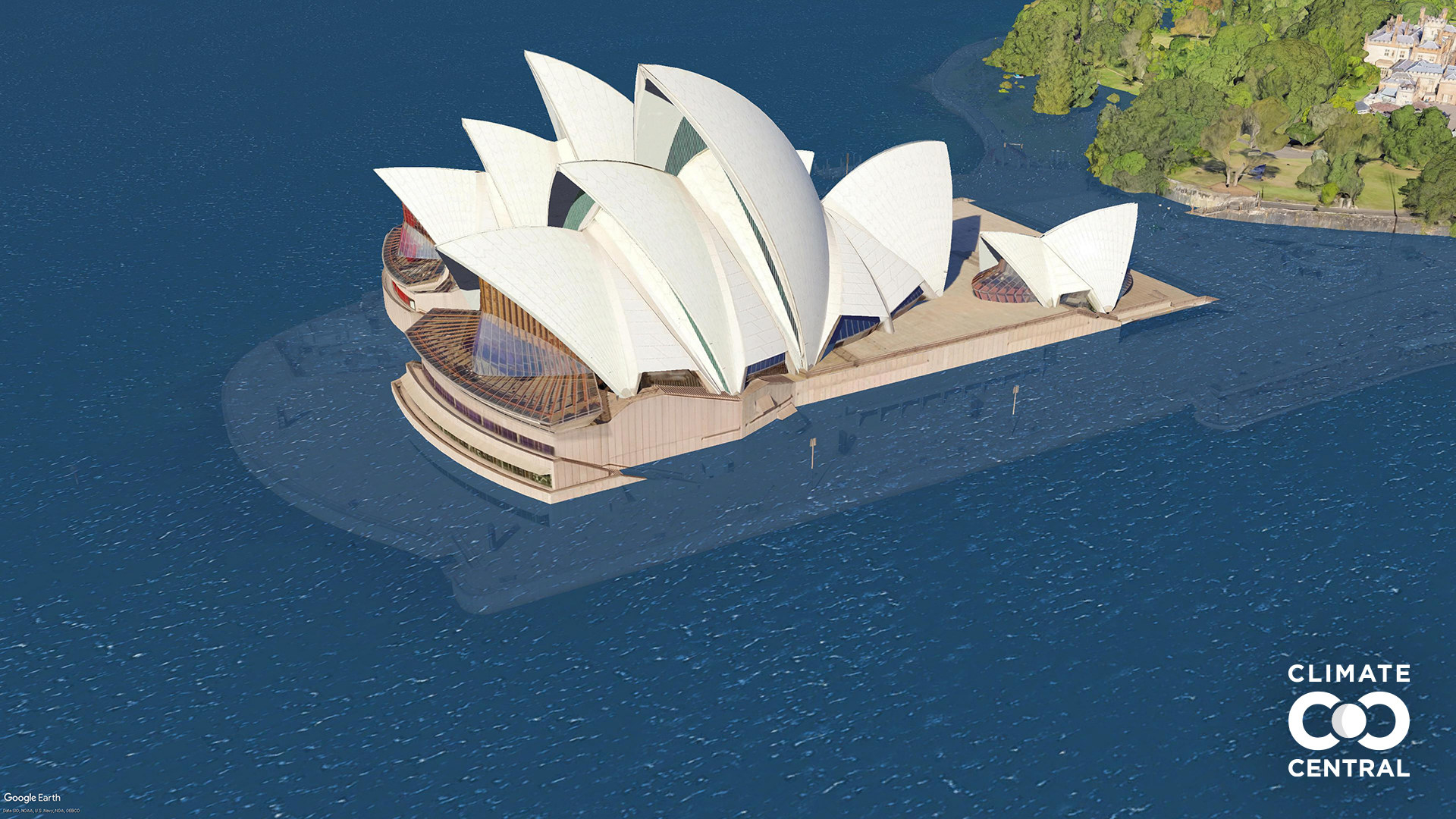 Water surrounds the opera house and cuts it off from the mainland