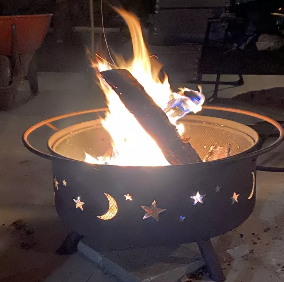 the firepit lit at night