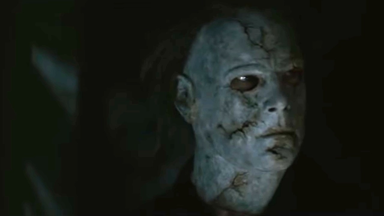 Michael Myers wears a cracked and faded white mask