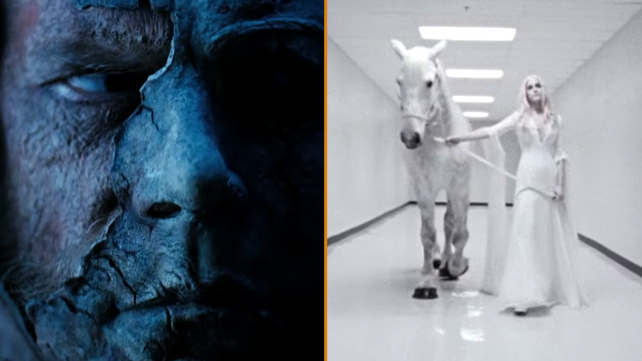 Michael Myers with half his mask missing, and Michael Myers mother wearing all white walking a horse down a hallway