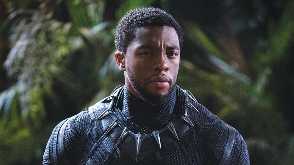 A close up of T&#x27;Challa as he wears the Black Panther suit