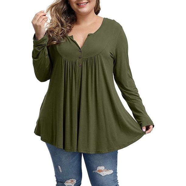 A green pleated tunic top
