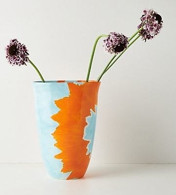 The orange and blue painted vase
