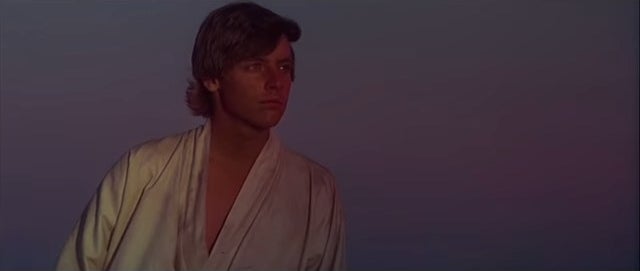 Luke staring at the twin suns on Tatooine in &quot;Star Wars: Episode IV - A New Hope&quot;