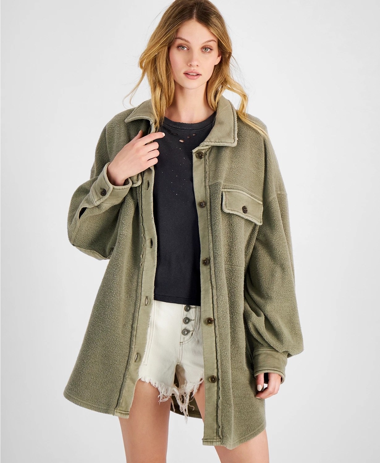 model wearing the olive green jacket