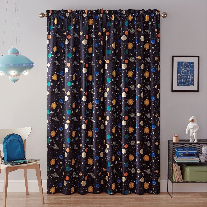 Space-themed blackout curtain