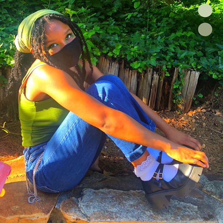 a reviewer posing in the platform mary jane loafers