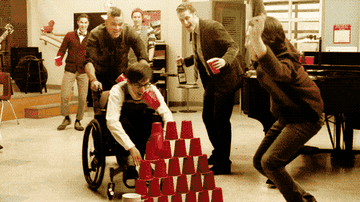 Someone knocking down a pyramid of red Solo cups in &quot;Glee.&quot;